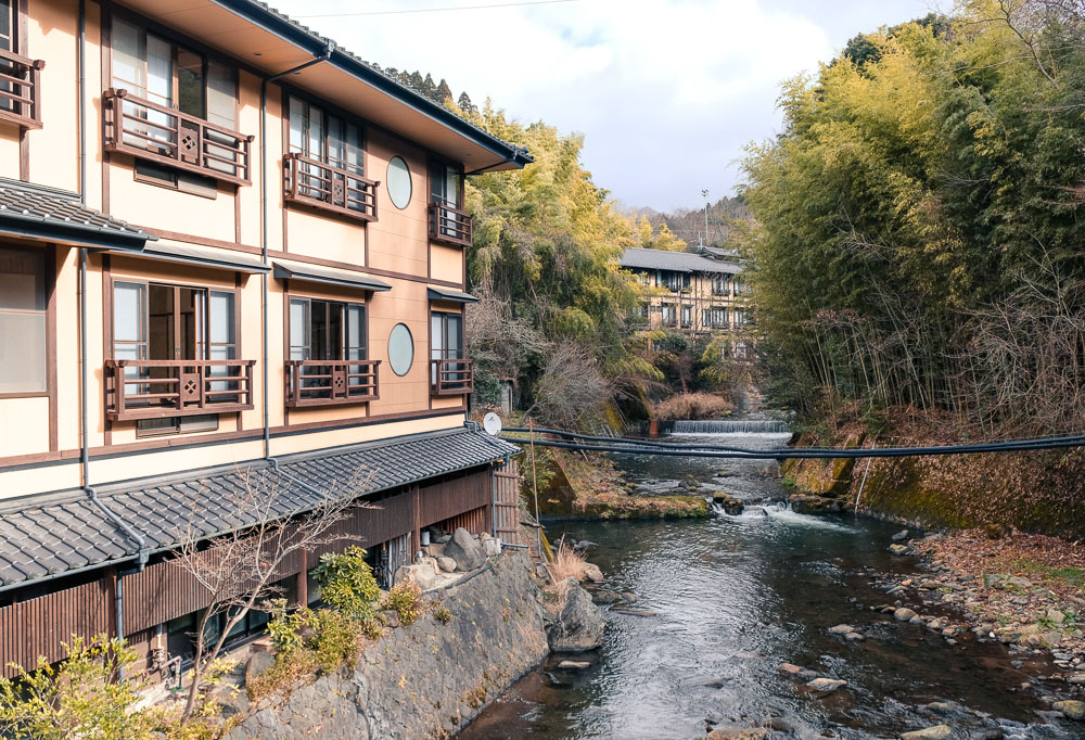 River through Kurokawa Onsen, Kumamoto Prefecture with traditional inns in the background